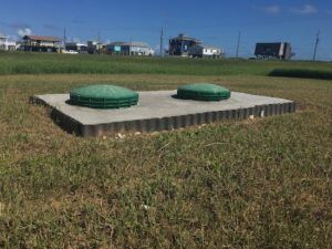 This root barrier stops grass roots from entering the septic tank
